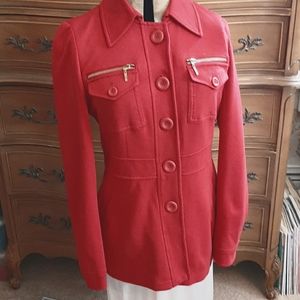 INC red button jacket with zipper detailing.